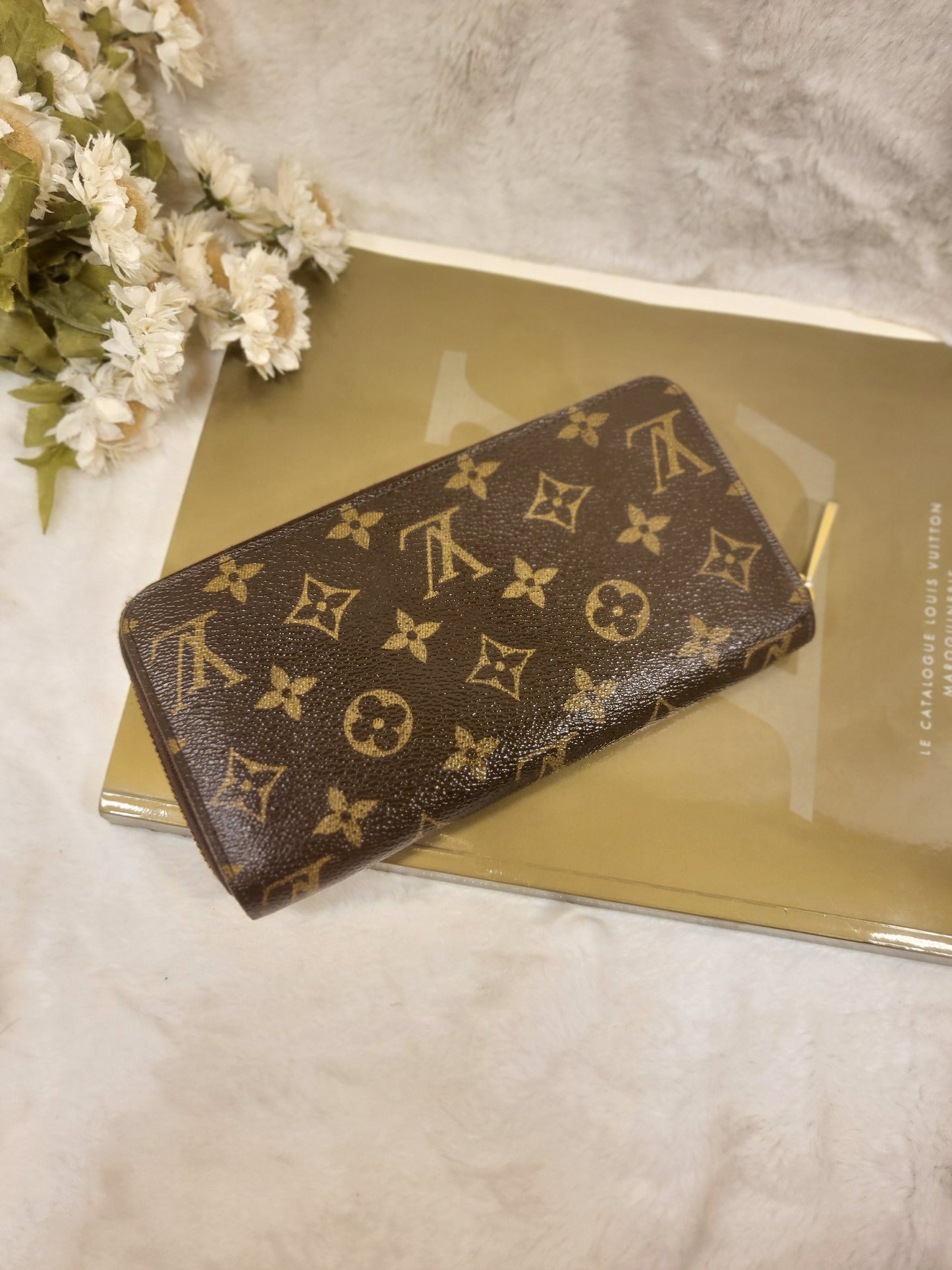 Authentic pre-owned Louis Vuitton Zippy wallet monogram