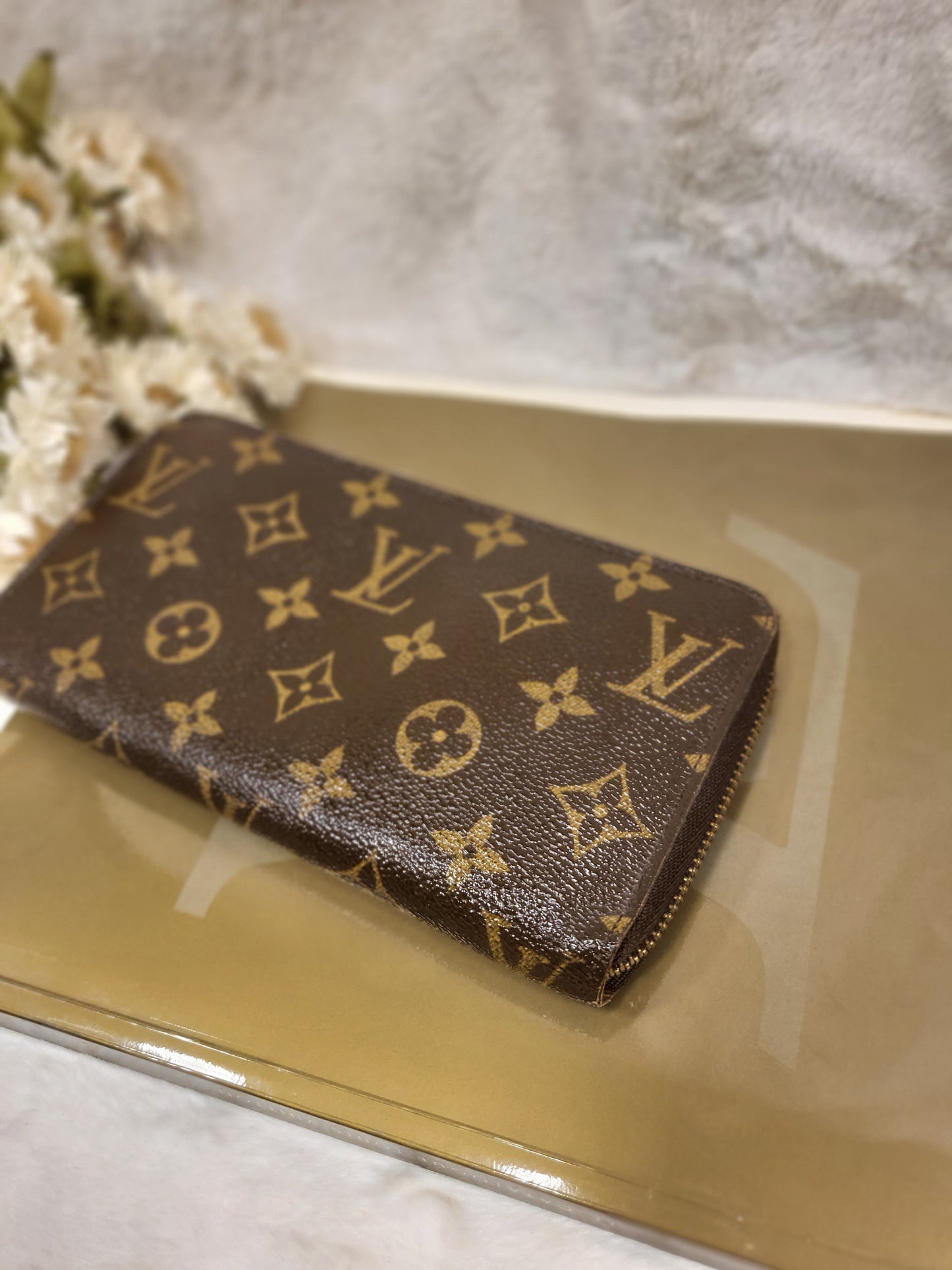 Authentic pre-owned Louis Vuitton Zippy wallet monogram