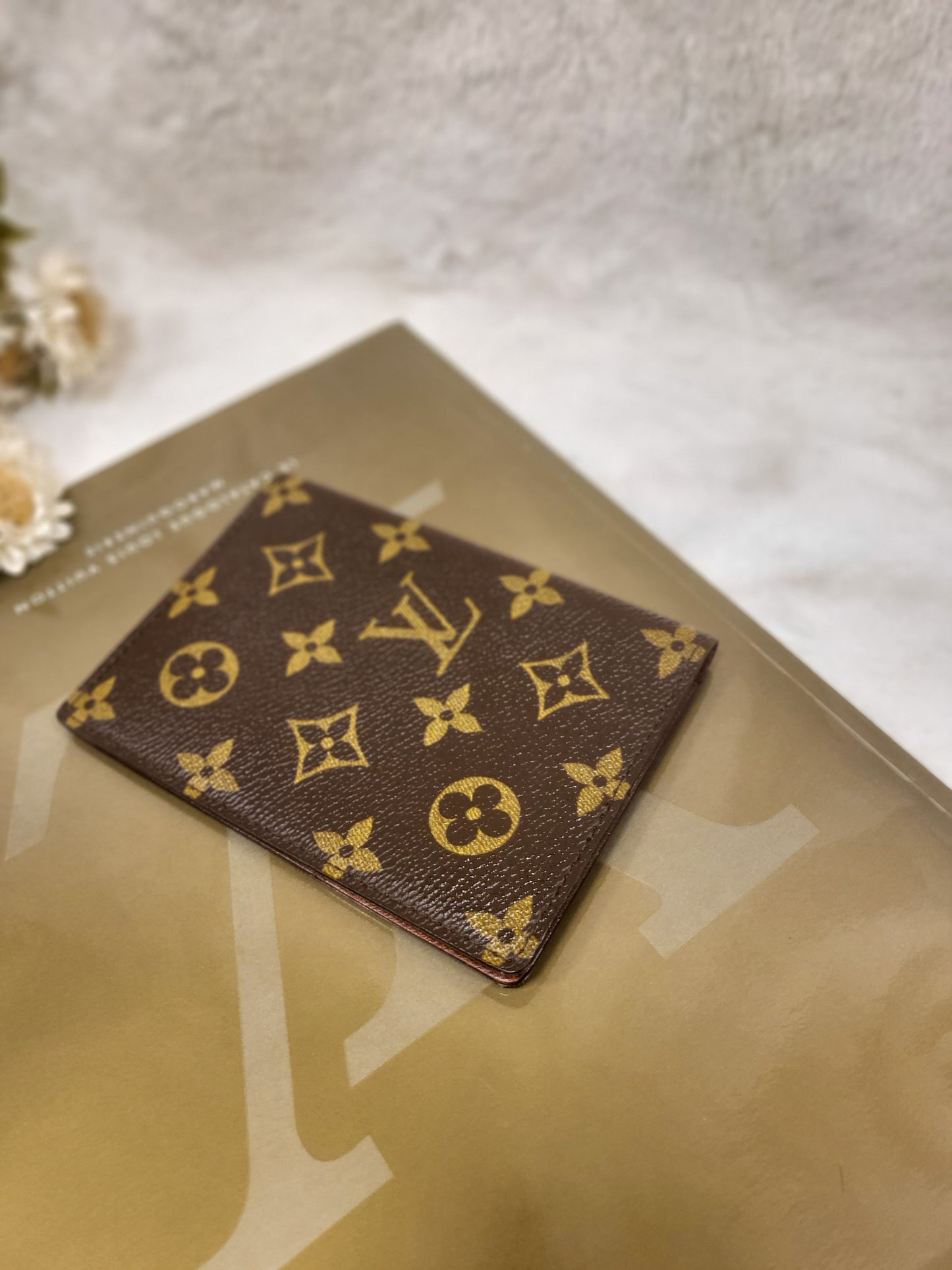 Authentic pre-owned Louis Vuitton passport holder