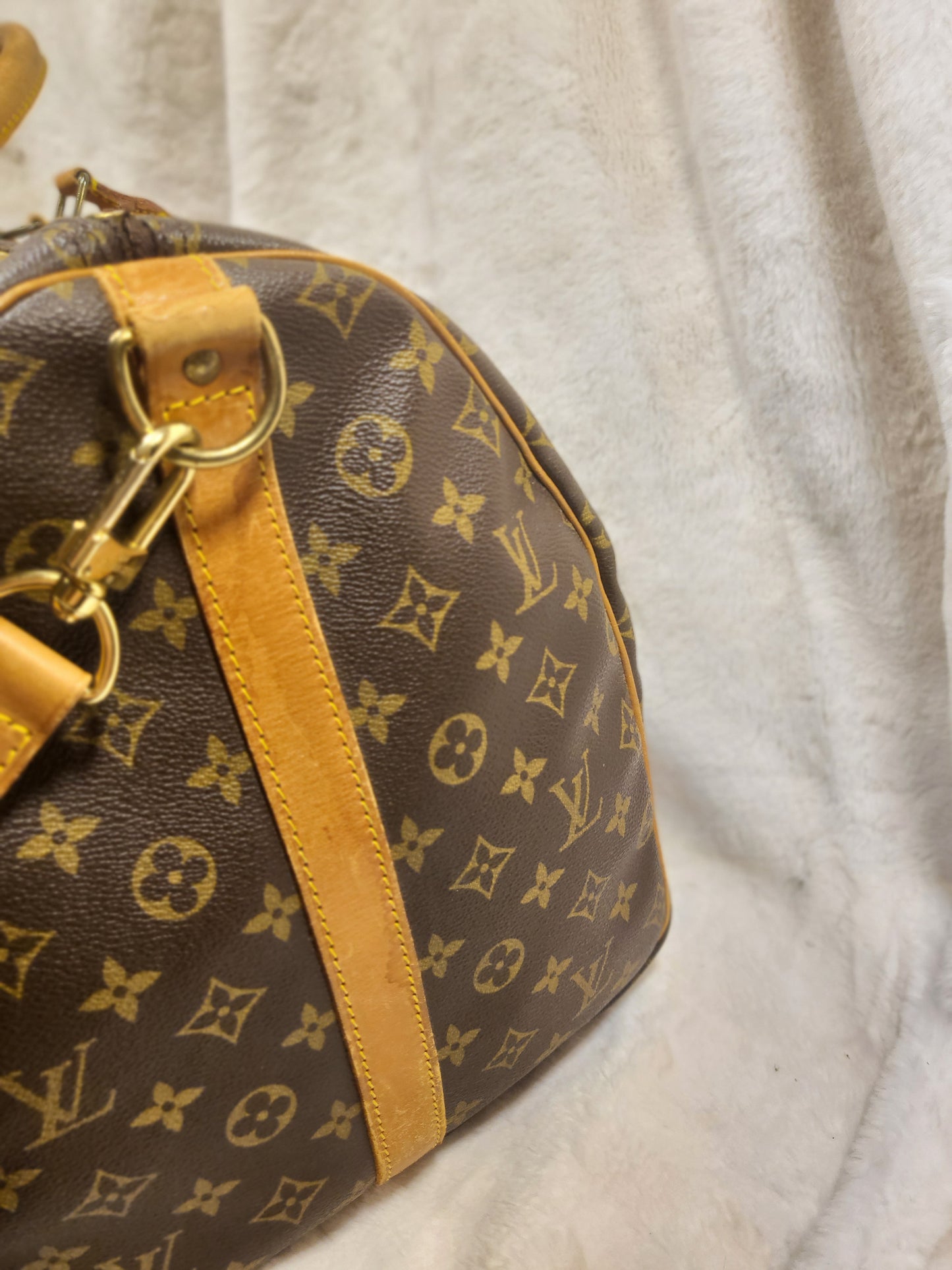Authentic pre-owned Louis Vuitton Keepall 55 bandoliere