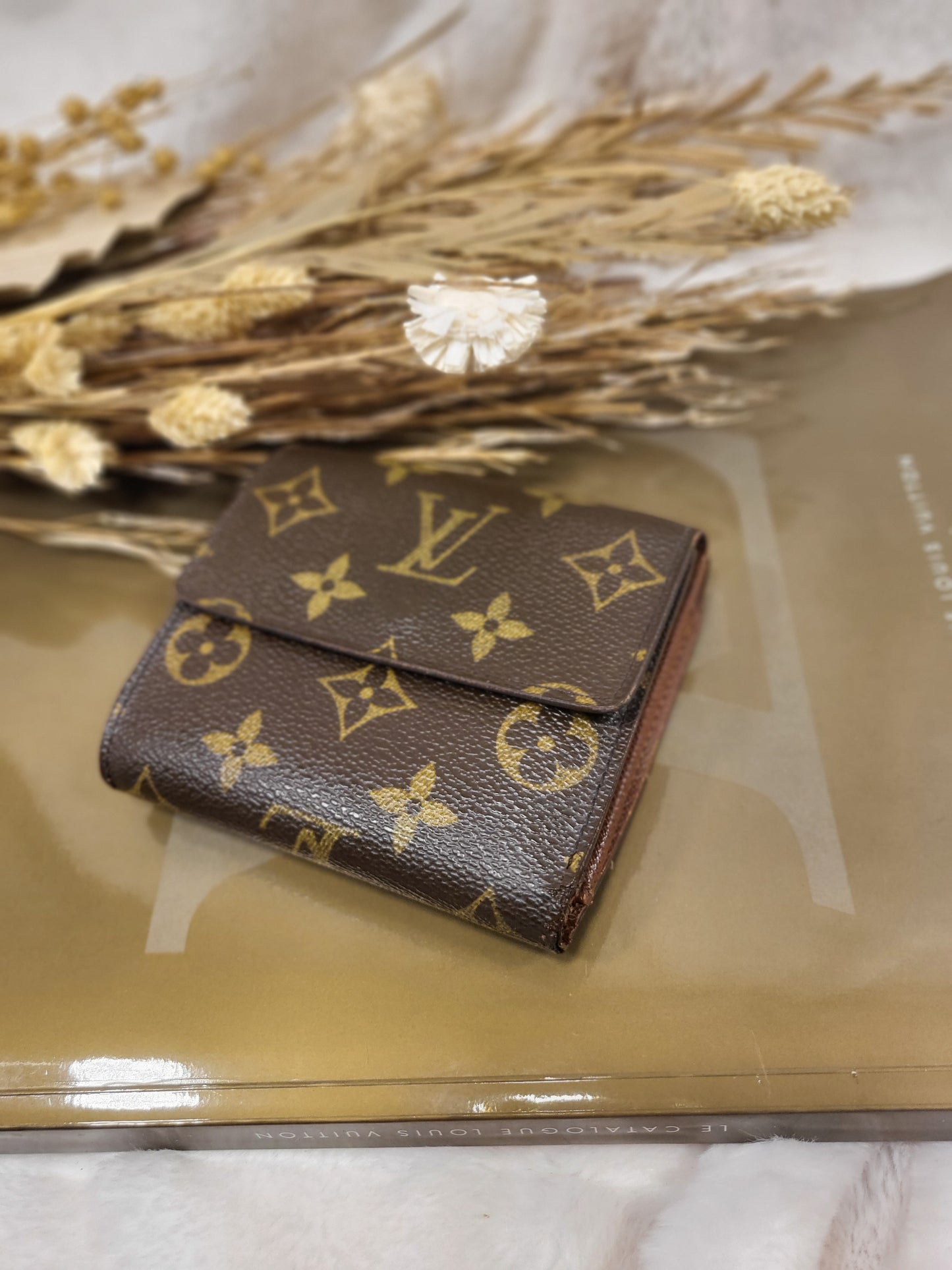 Authentic pre-owned Louis Vuitton Elise Trifold wallet