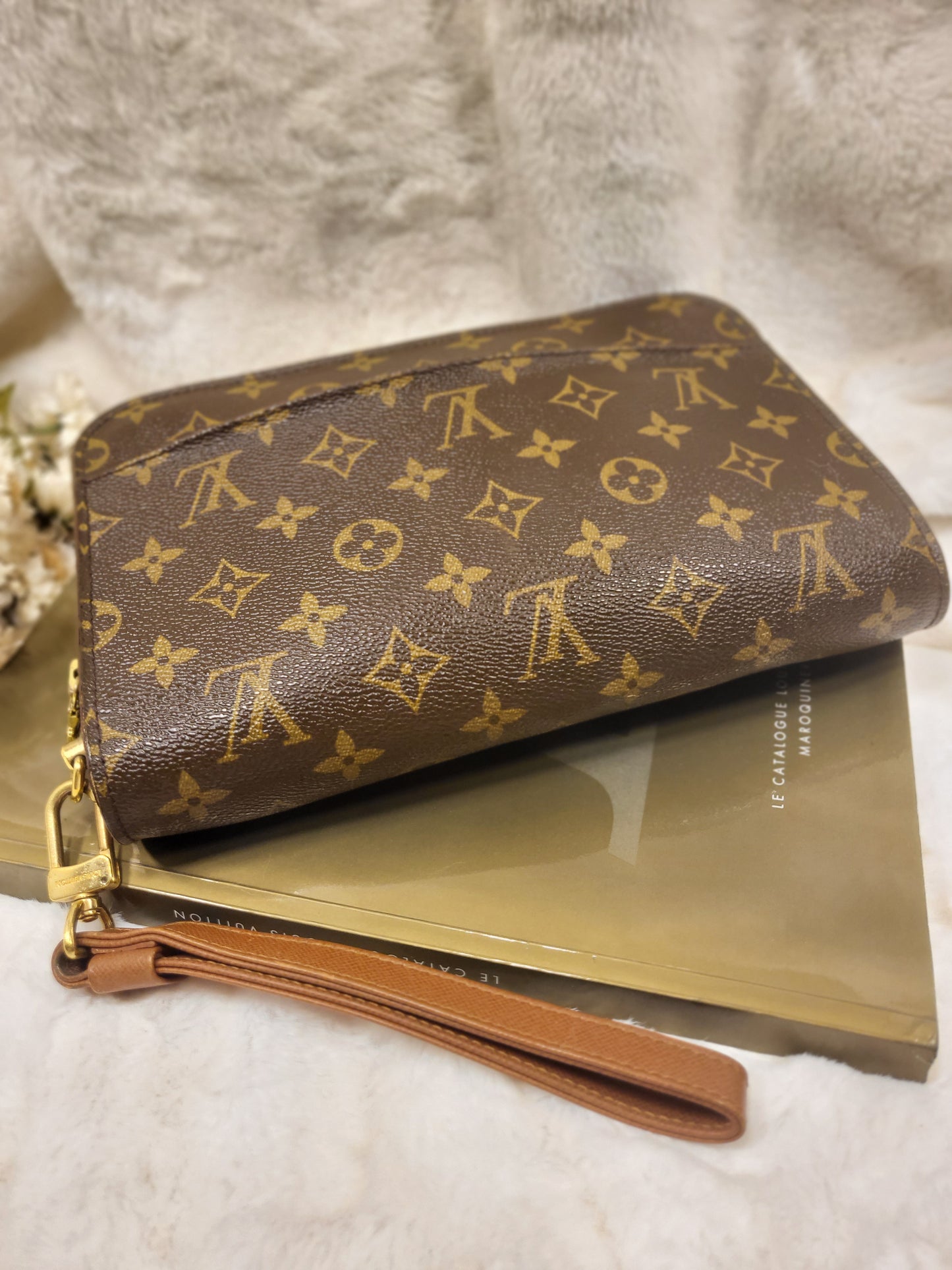Authentic pre-owned Louis Vuitton Orsay monogram clutch