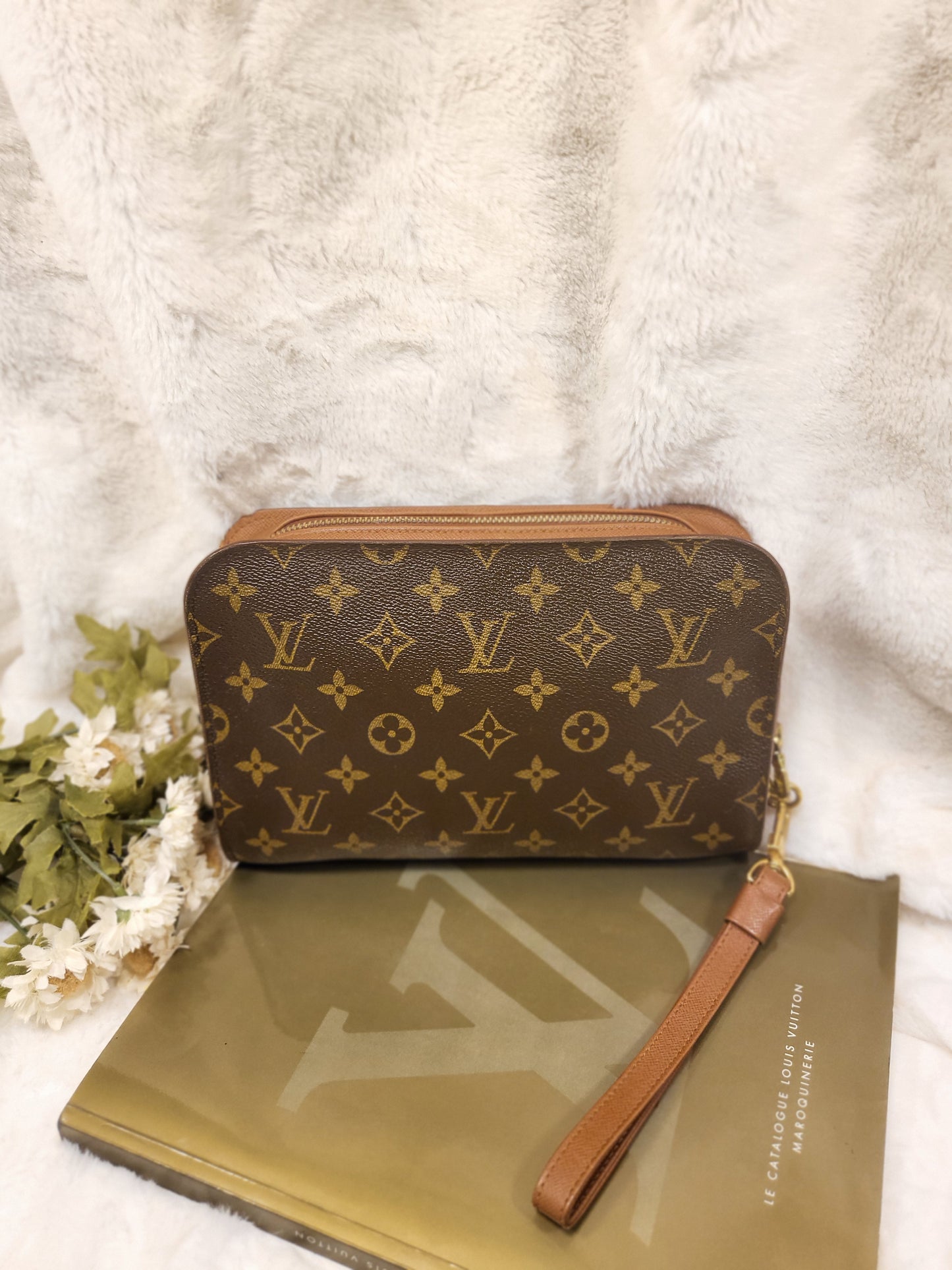 Authentic pre-owned Louis Vuitton Orsay monogram clutch