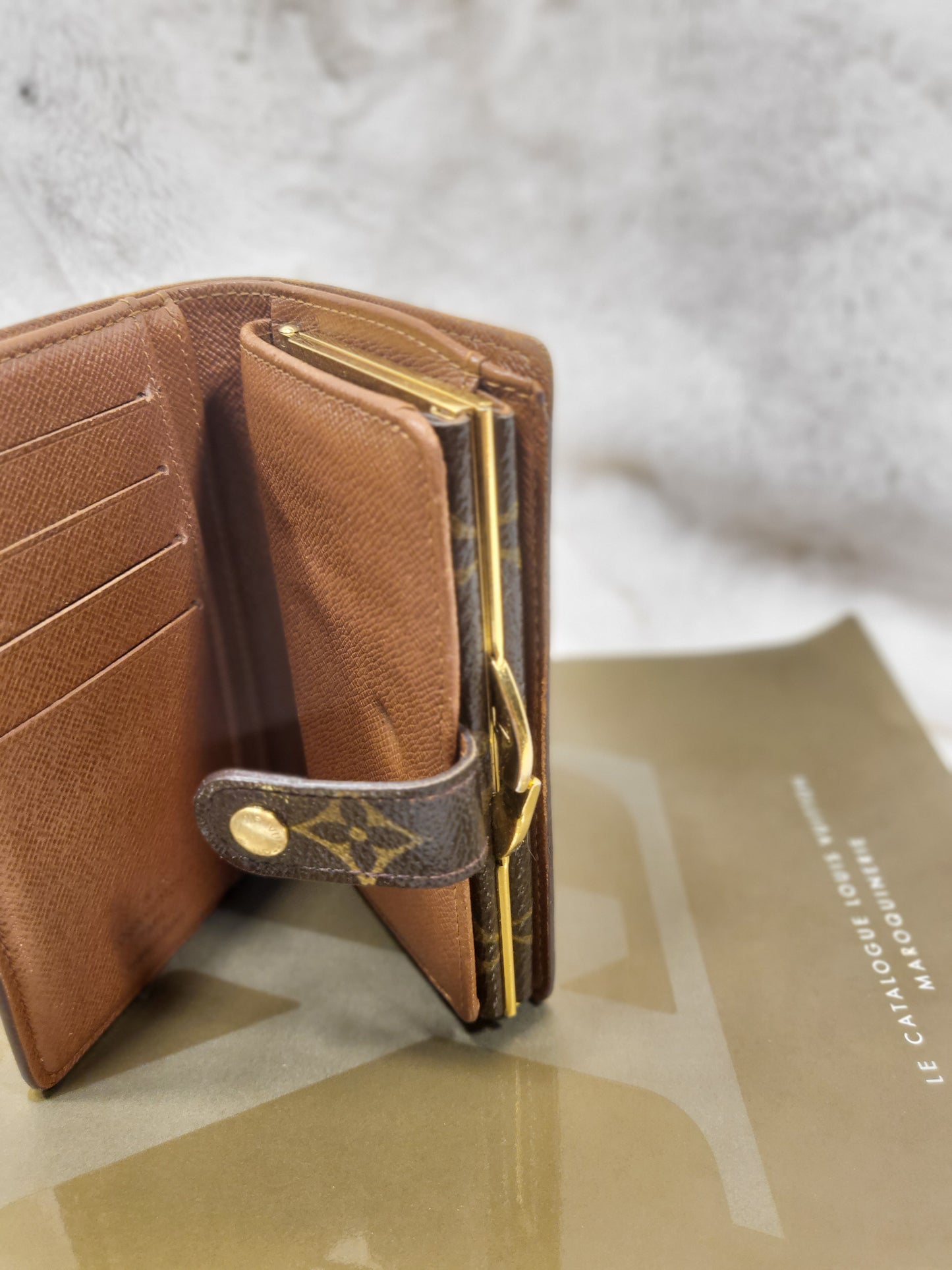 Authentic pre-owned Louis Vuitton kisslock wallet