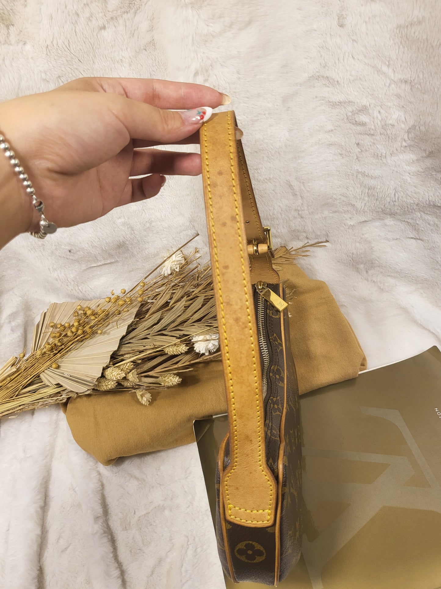 Authentic pre-owned Louis Vuitton Croissant pm