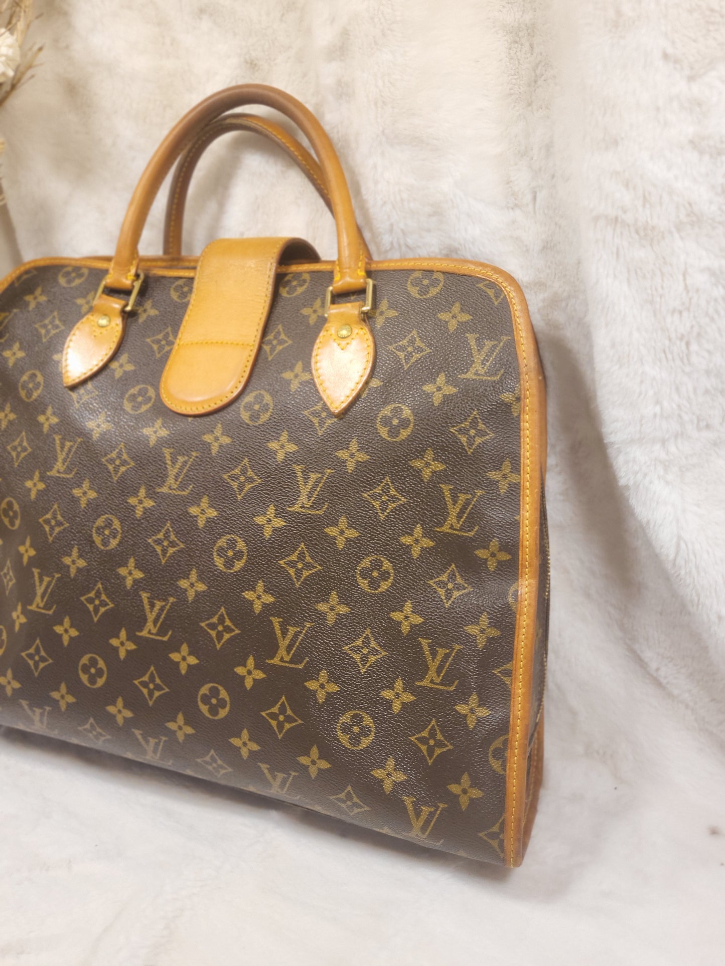 Authentic pre-owned Louis Vuitton Rivoli briefcase