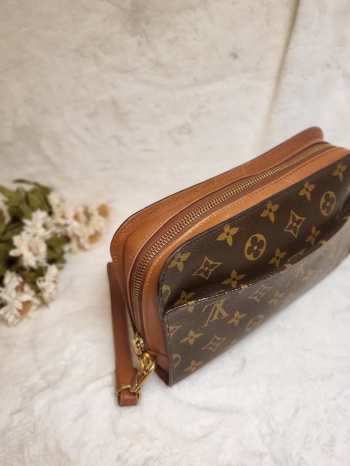Authentic pre-owned Louis Vuitton Orsay monogram clutch