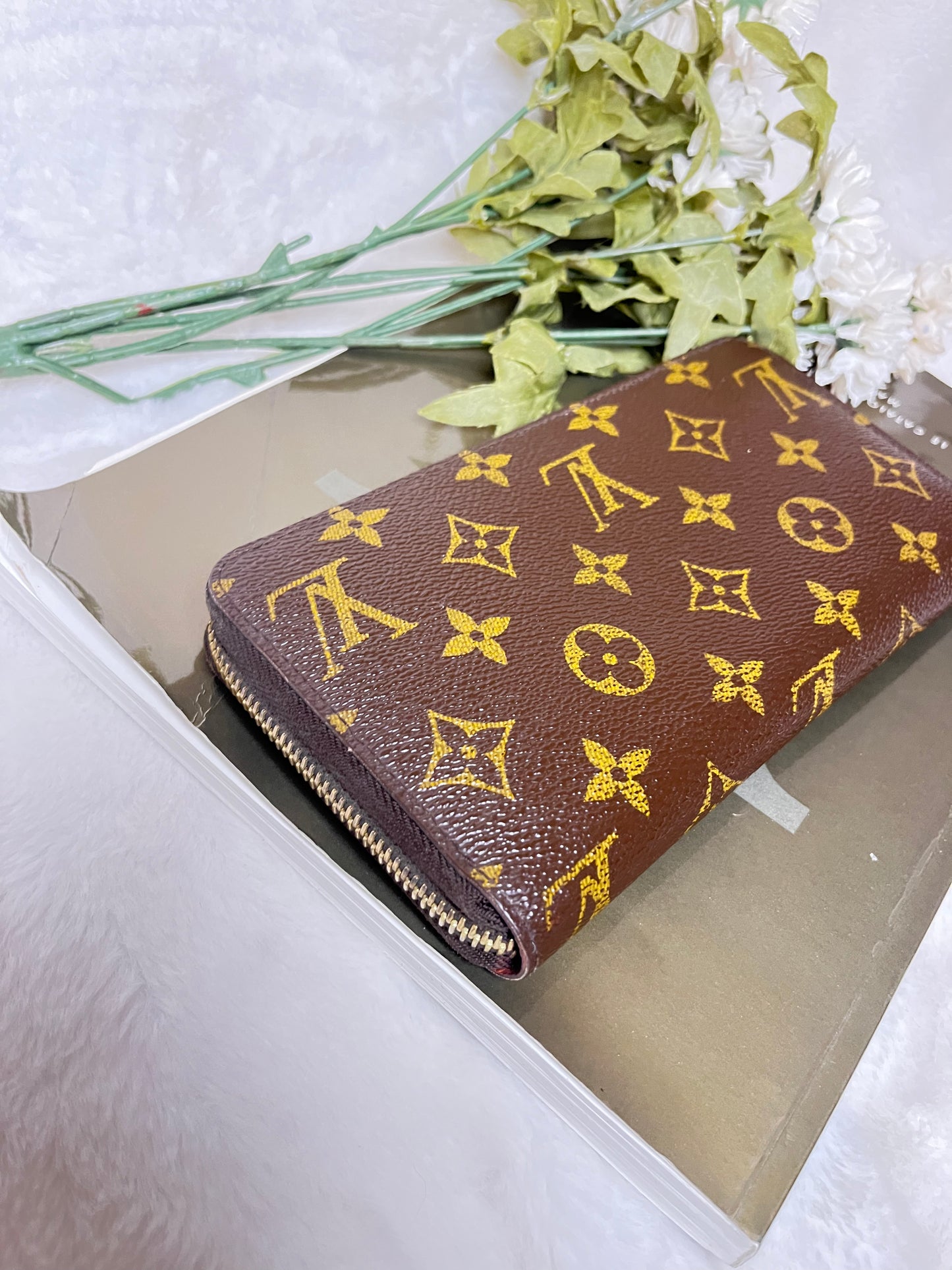 Authentic pre-owned Louis Vuitton Zippy wallet