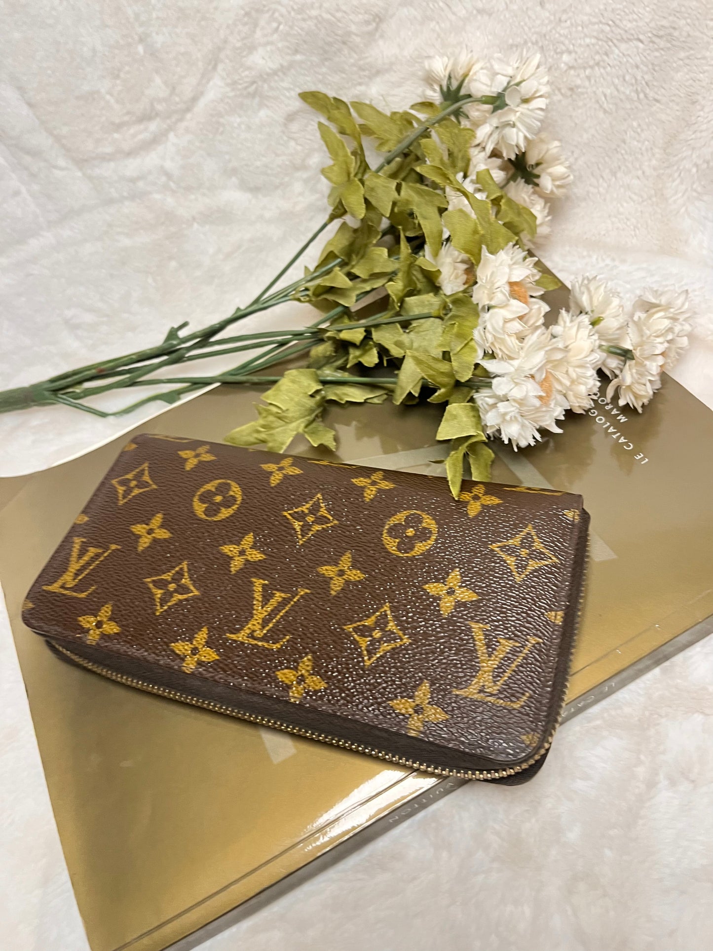 Authentic pre-owned Louis Vuitton Zippy wallet