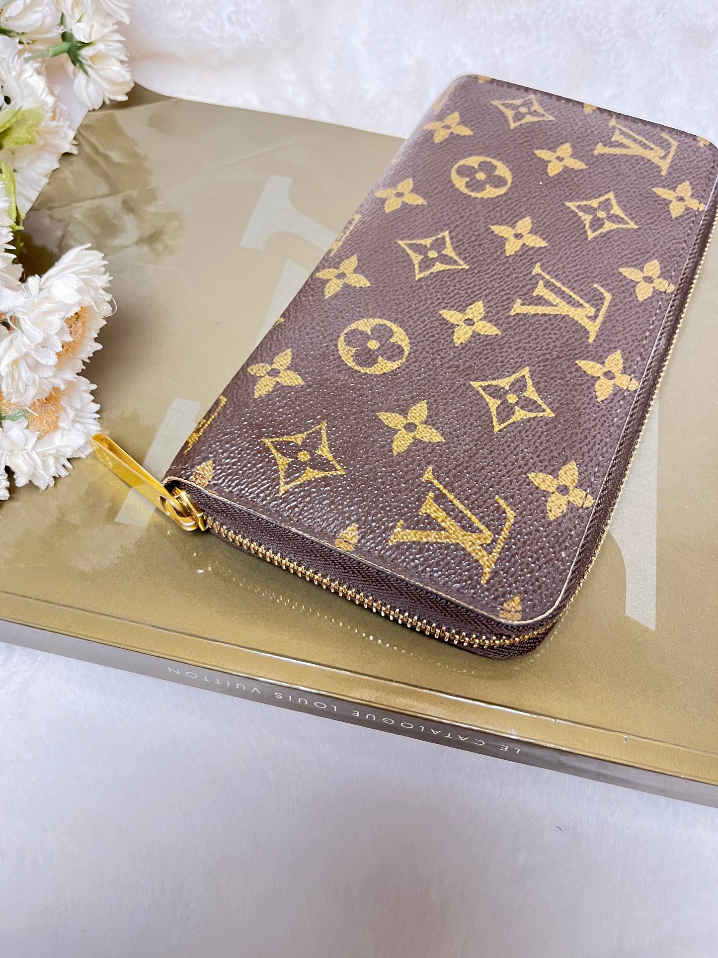 Authentic pre-owned Louis Vuitton compact zippy wallet