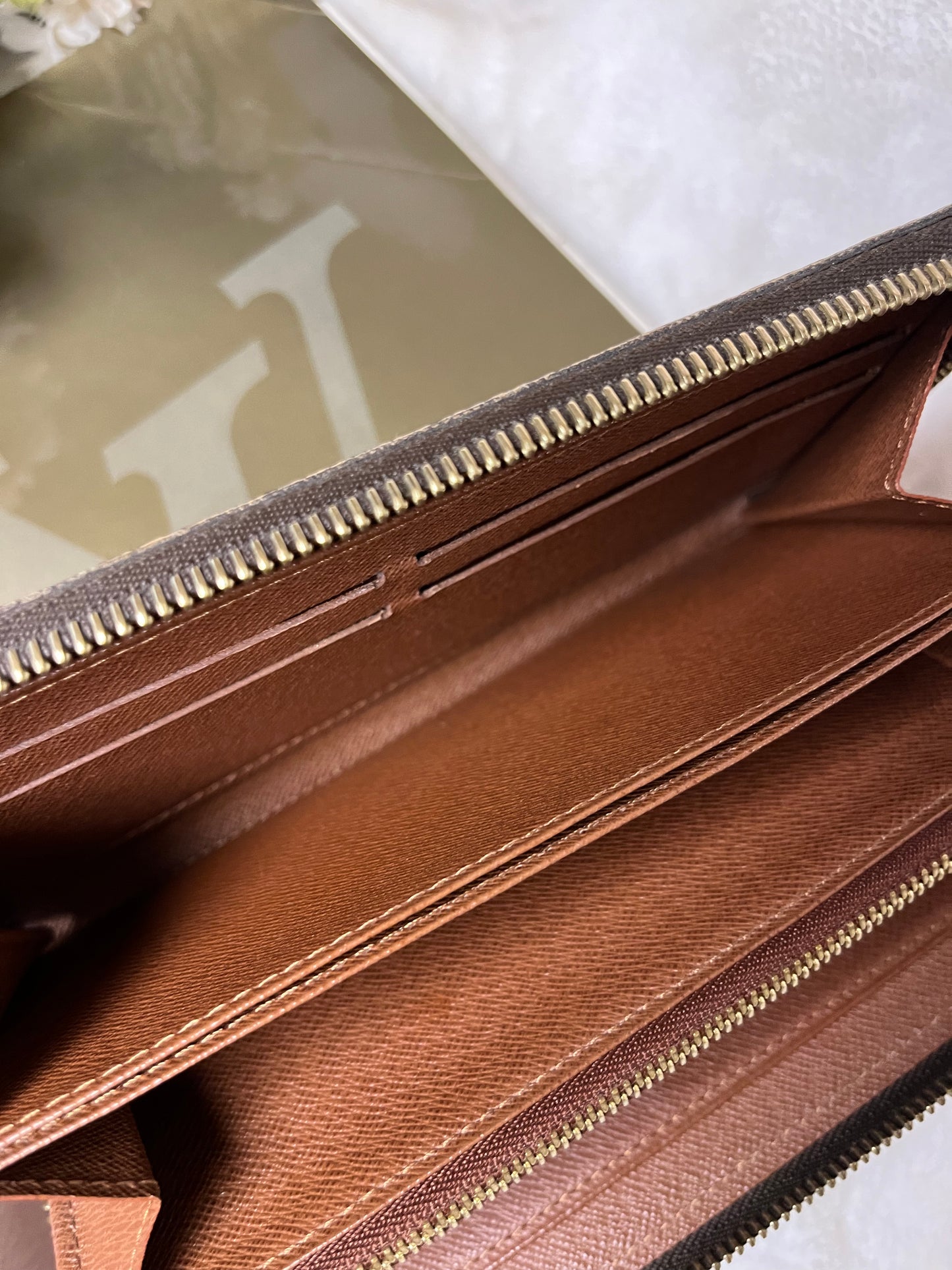 Authentic pre-owned Louis Vuitton compact zippy wallet