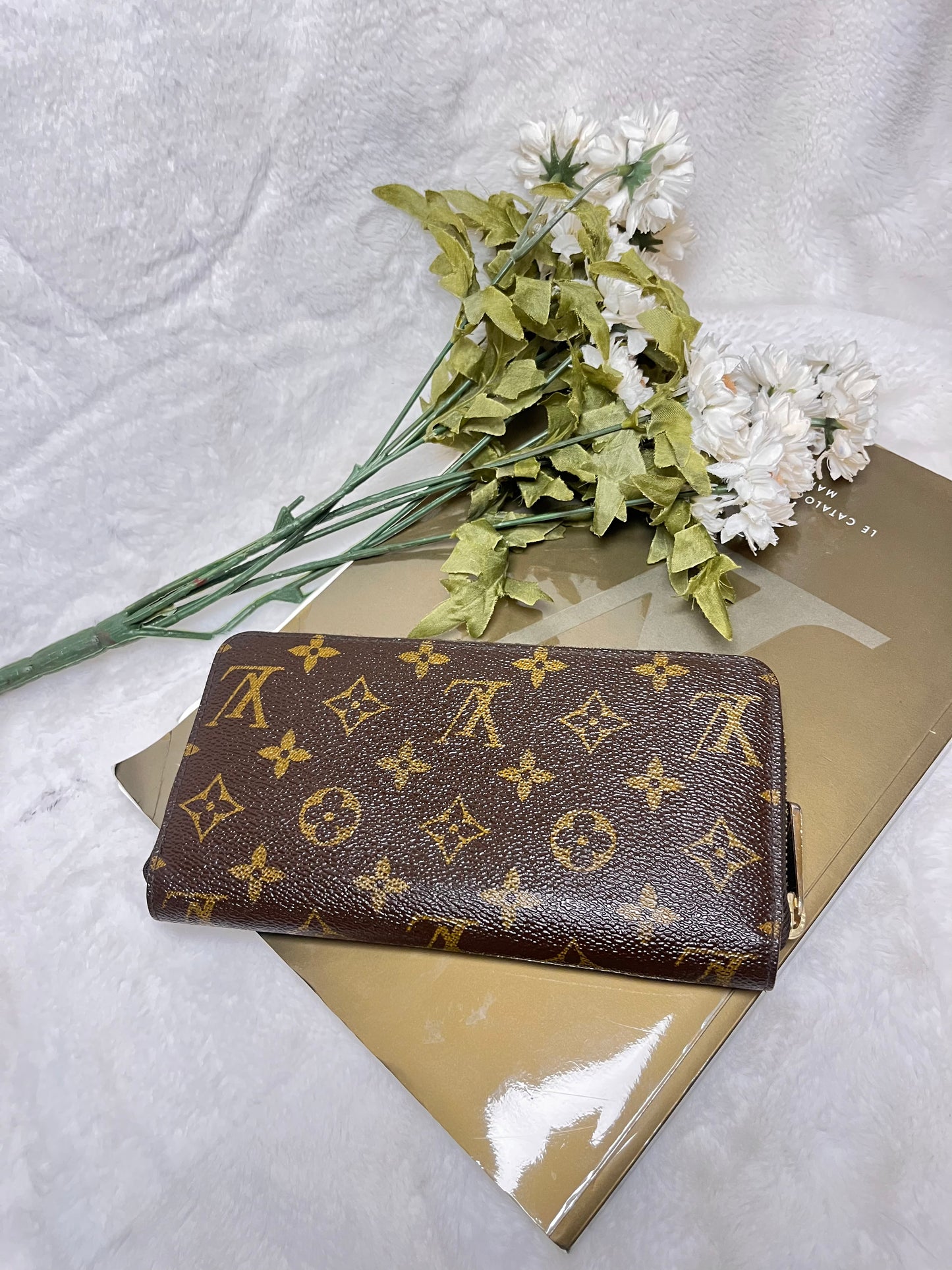Authentic pre-owned Louis Vuitton Zippy wallet
