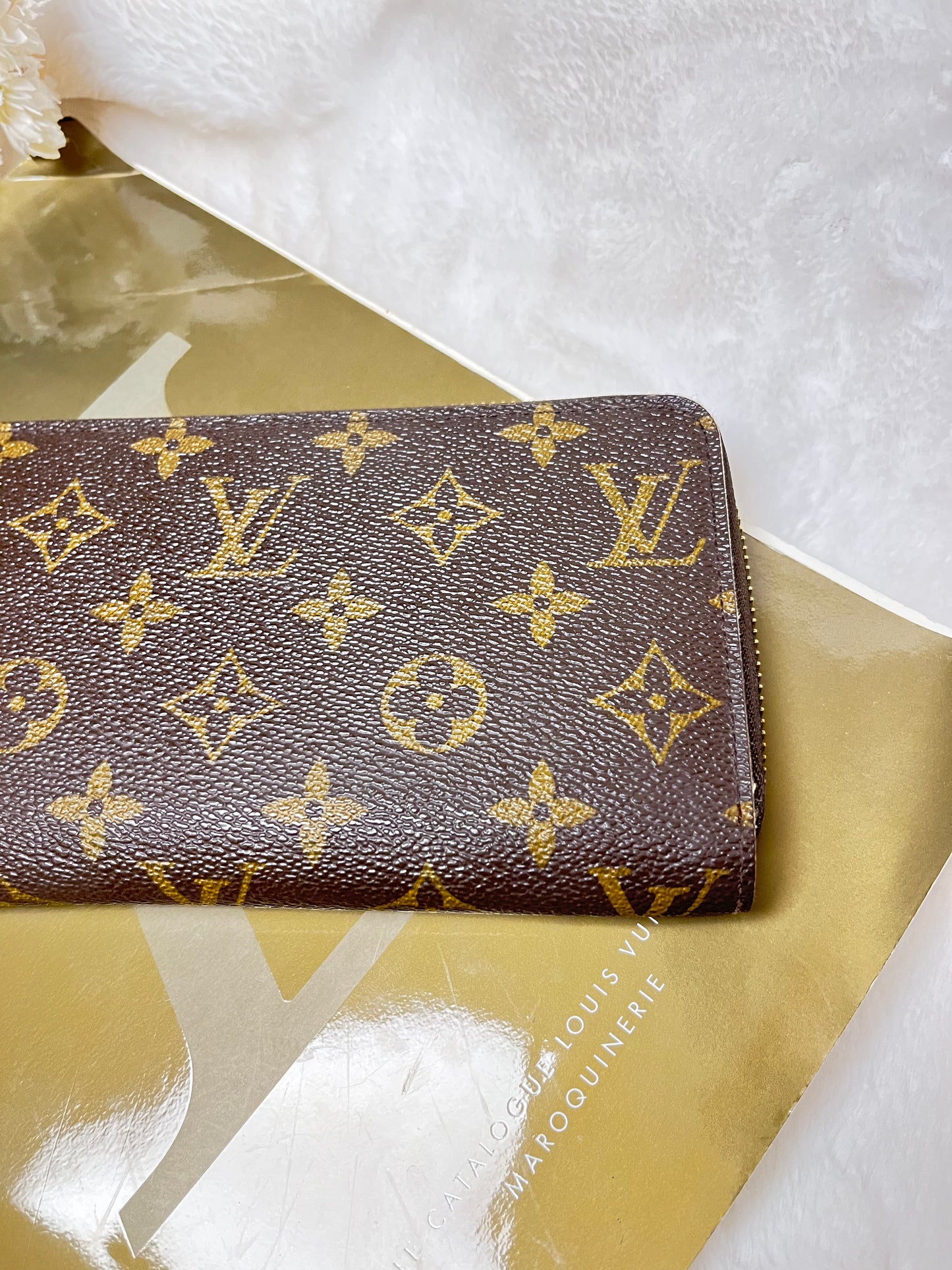 Authentic pre-owned Louis Vuitton compact zippy wallet