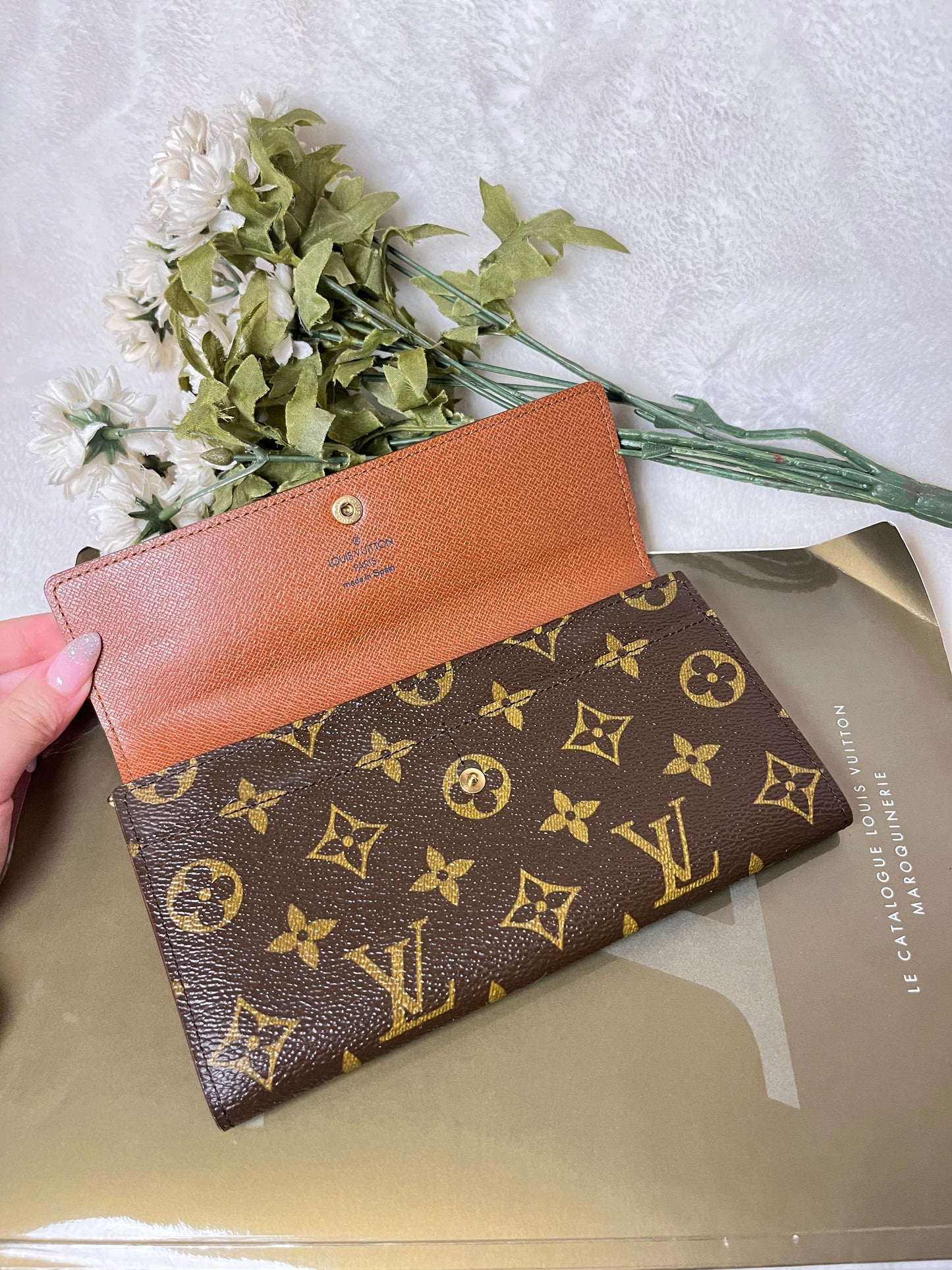 Authentic pre-owned Louis Vuitton Sarah Wallet