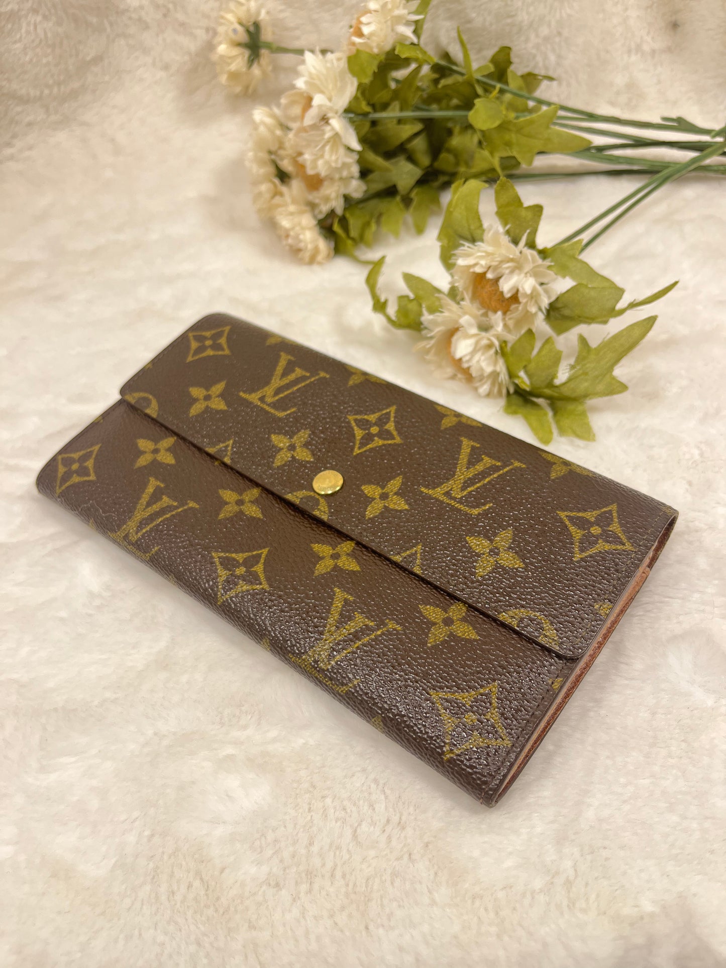Authentic pre-owned Louis Vuitton Sarah wallet
