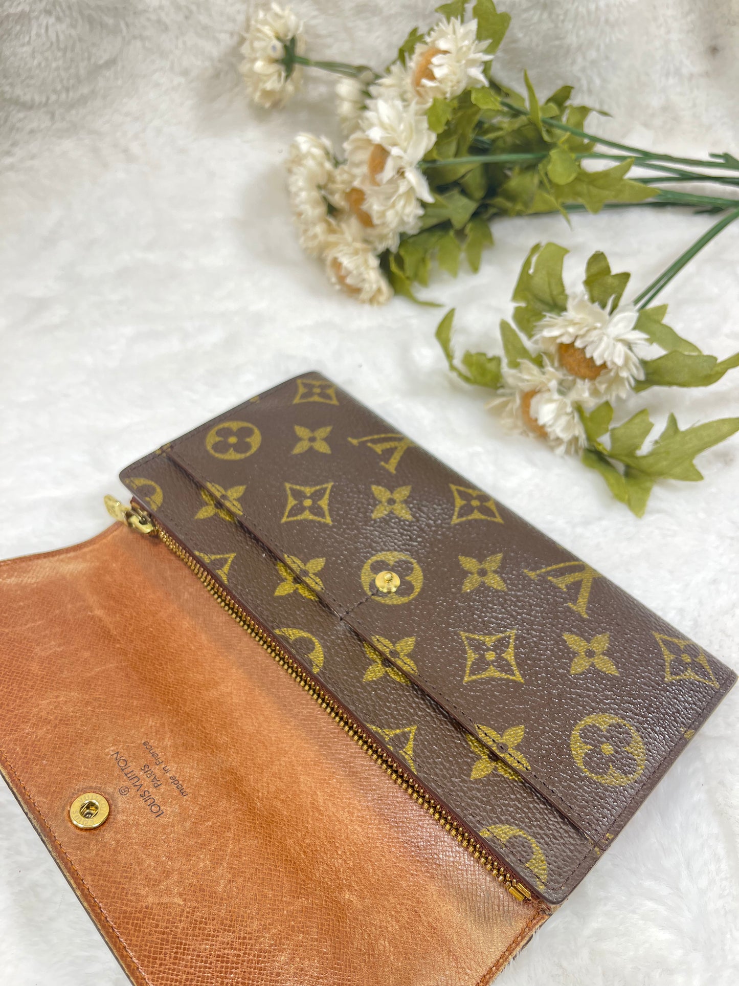 Authentic pre-owned Louis Vuitton Sarah wallet