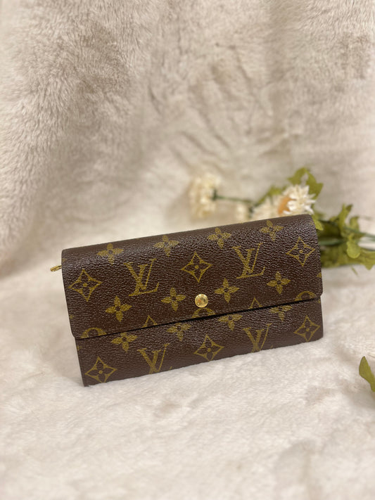 Authentic pre-owned Louis Vuitton Sarah wallet