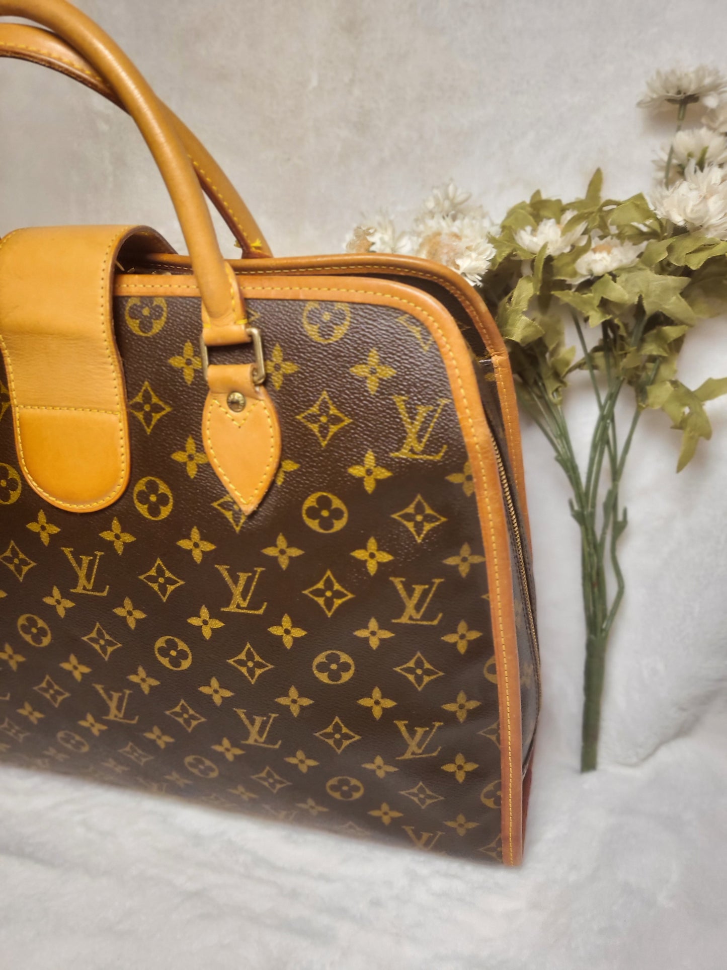 Authentic pre-owned Louis Vuitton Rivoli briefcase