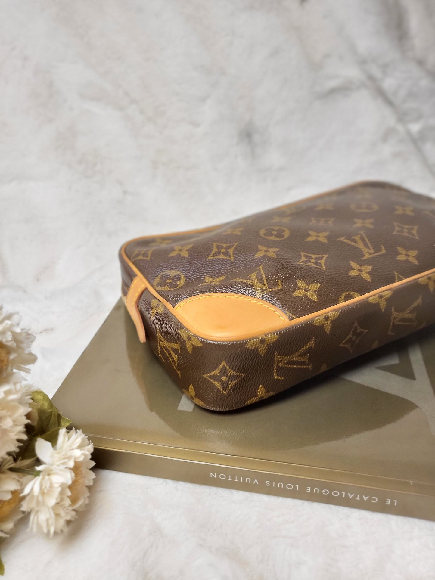 Authentic pre-owned Louis Vuitton Marly Dragonne clutch