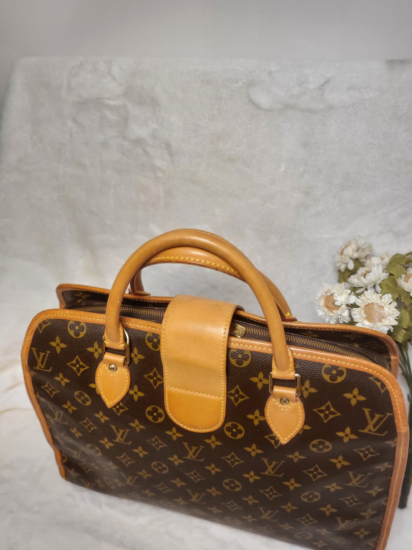 Authentic pre-owned Louis Vuitton Rivoli briefcase