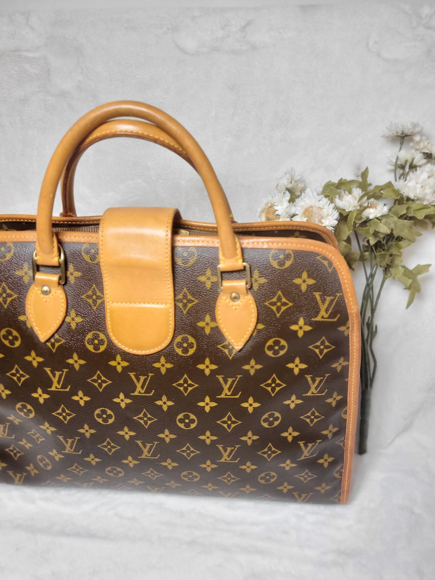 Authentic pre-owned Louis Vuitton Rivoli briefcase