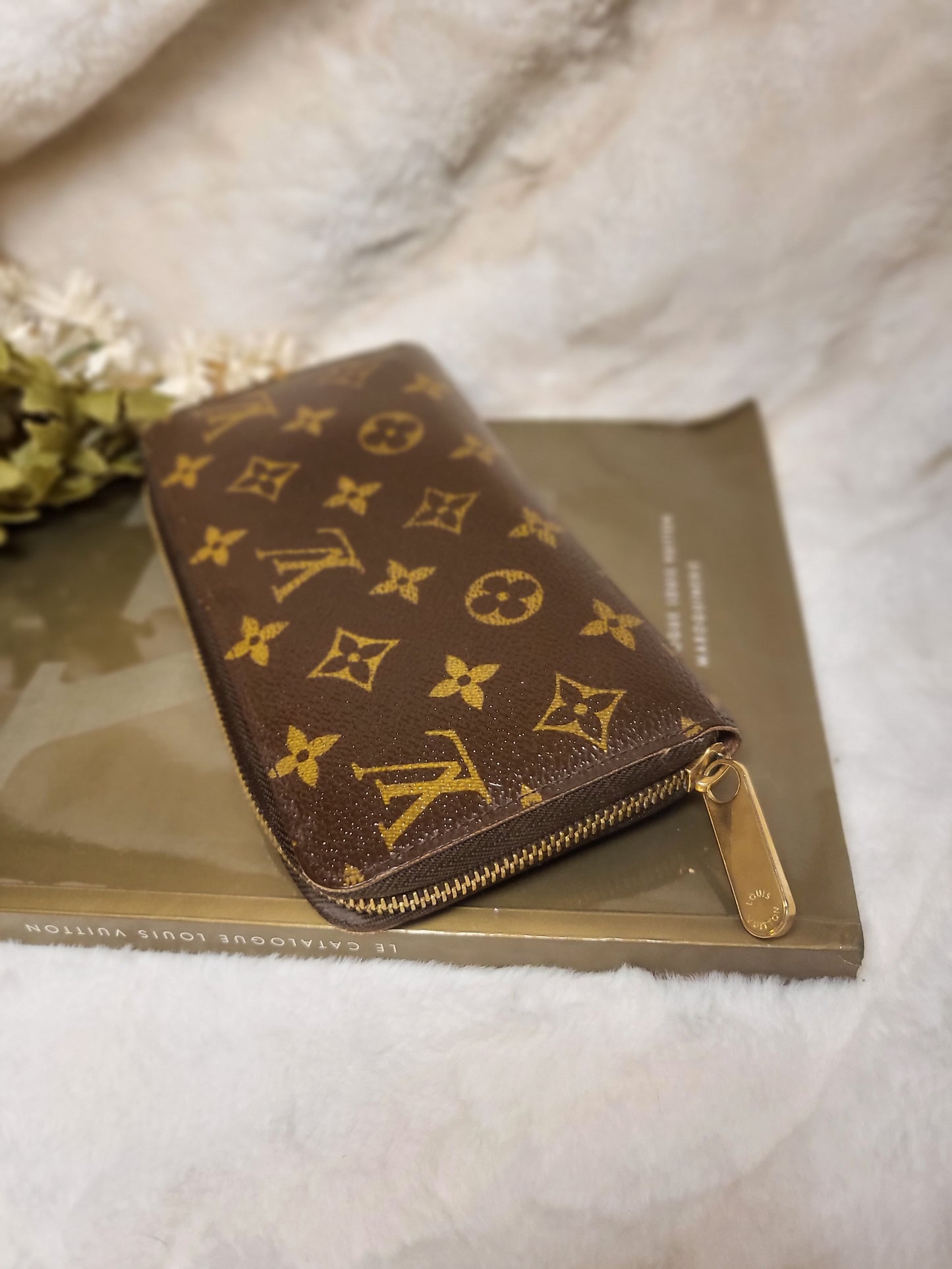 Authentic pre-owned Louis Vuitton Zippy compact wallet
