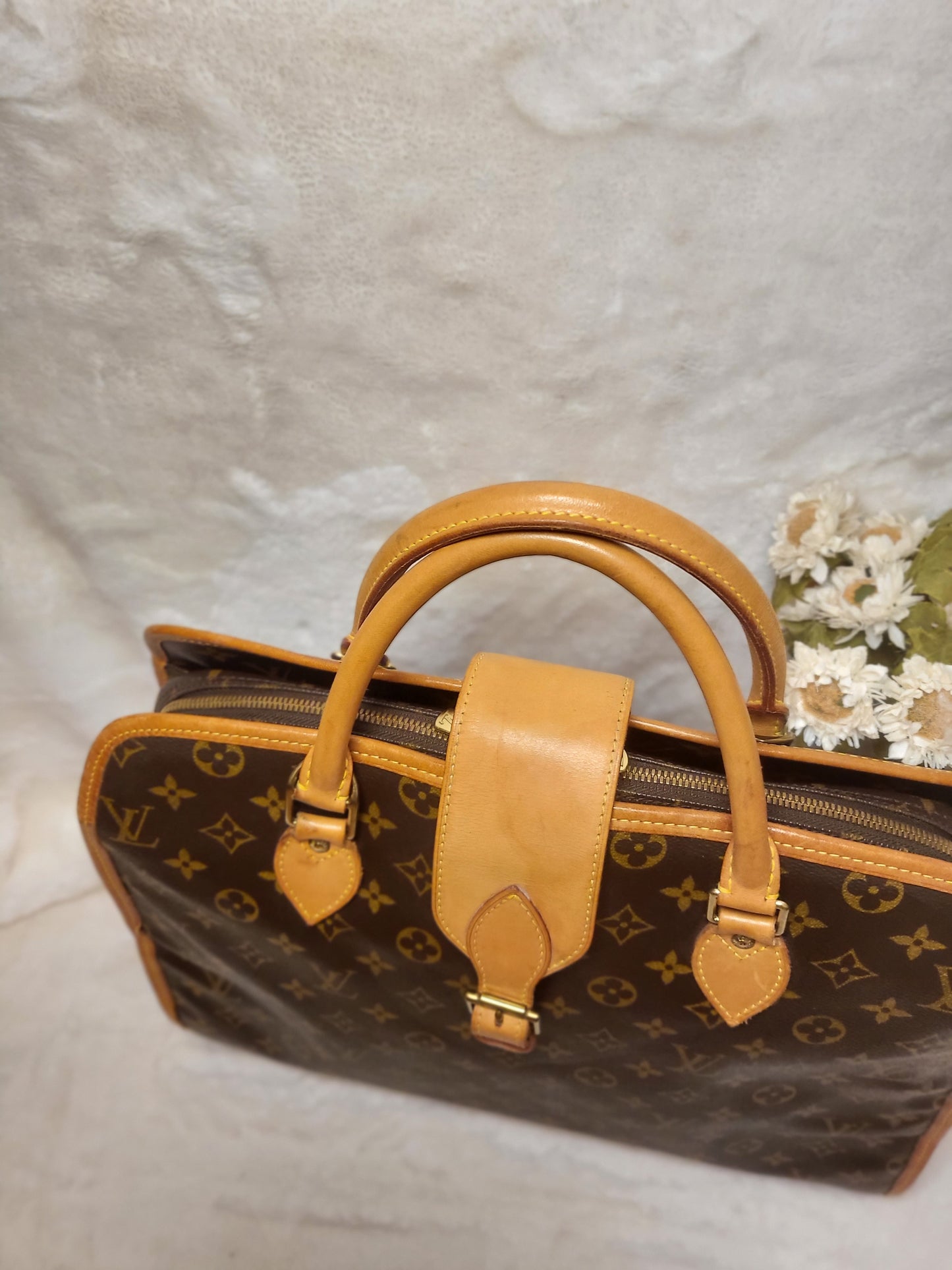 Authentic pre-owned Louis Vuitton Rivoli briefcase