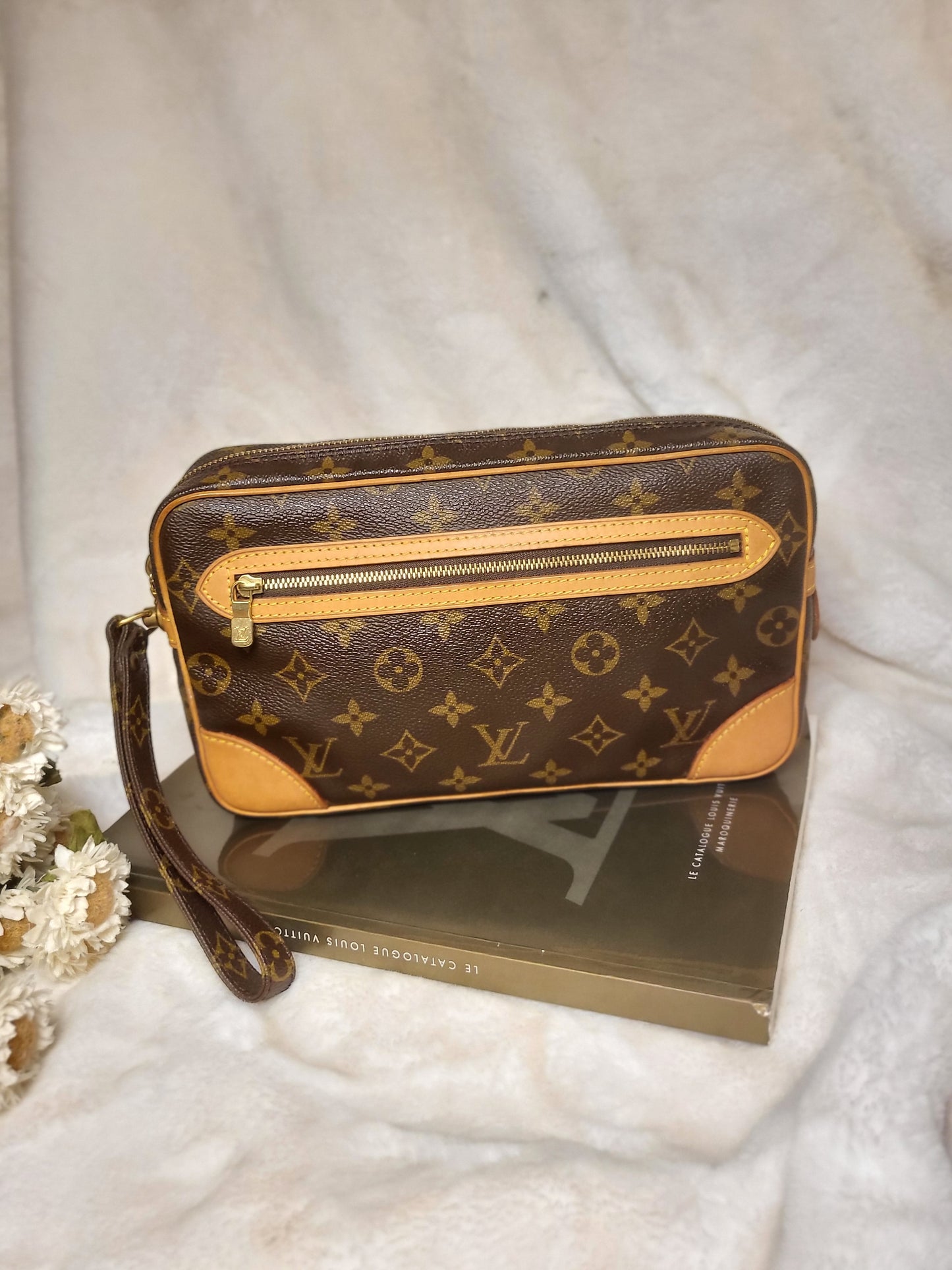 Authentic pre-owned Louis Vuitton Marly Dragonne clutch