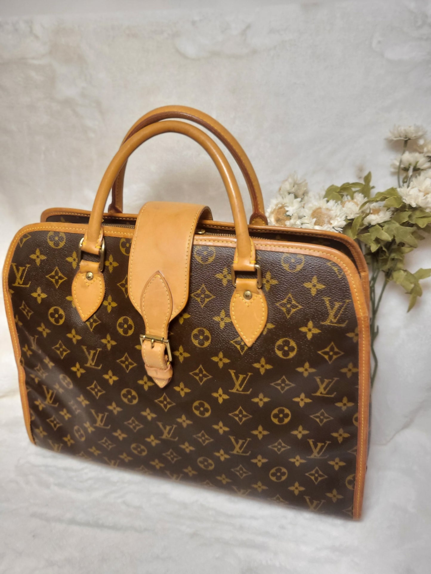 Authentic pre-owned Louis Vuitton Rivoli briefcase