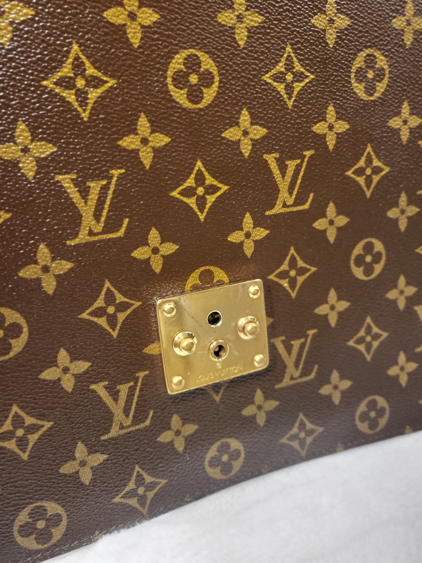 Authentic pre-owned Louis Vuitton serviette conseiller clutch