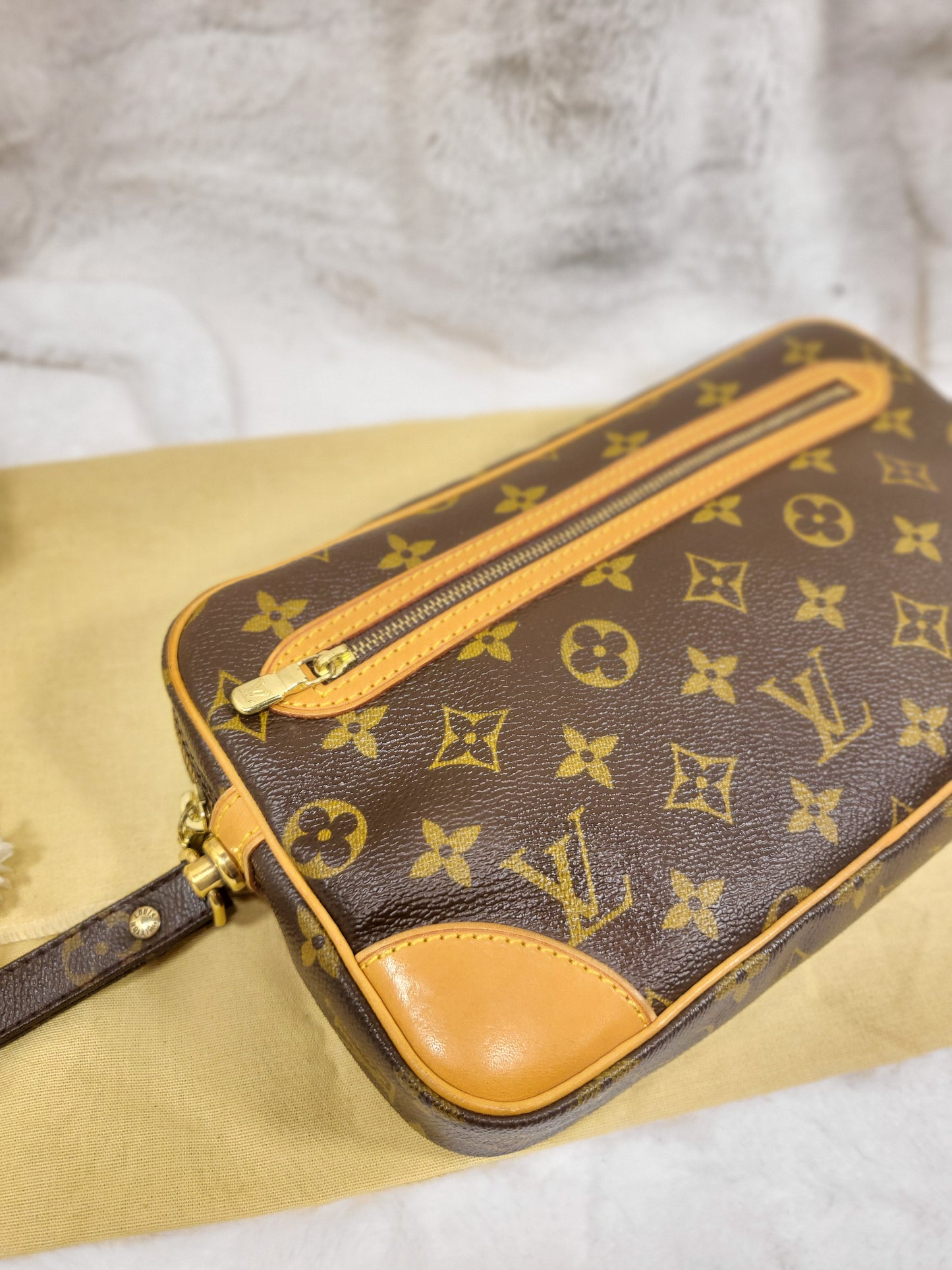 Authentic pre-owned Louis Vuitton Marly Dragonne monogram clutch