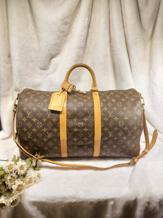 Authentic pre-owned Louis Vuitton Keepall 50 bandoliere travel luggage bag